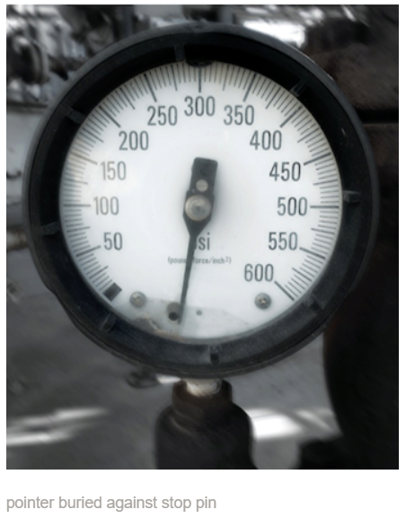 pointer buried against stop pin